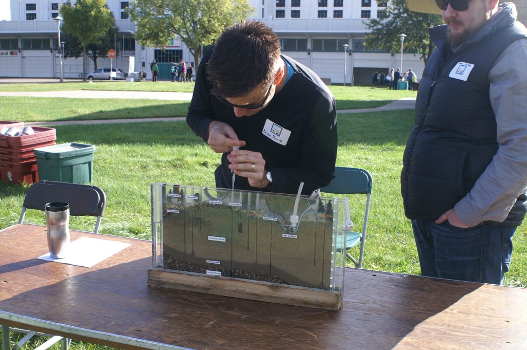 A young man using an educational device.